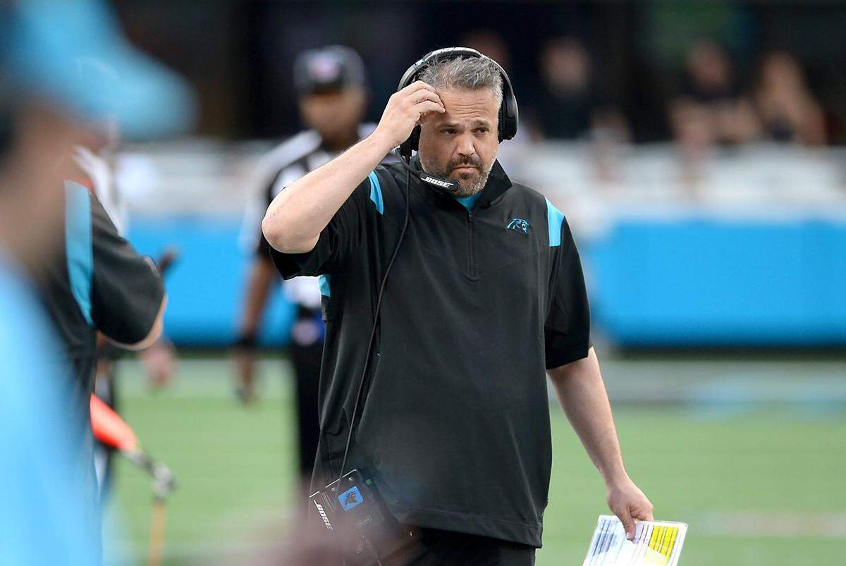 Carolina Panthers head coach Matt Rhule walks down the teamÕs sideline scratching his head during action against the Tampa Bay Buccaneers on Sunday, December 26, 2021 at Bank of America Stadium in Charlotte, NC. The Buccaneers defeated the Panthers 32-6.