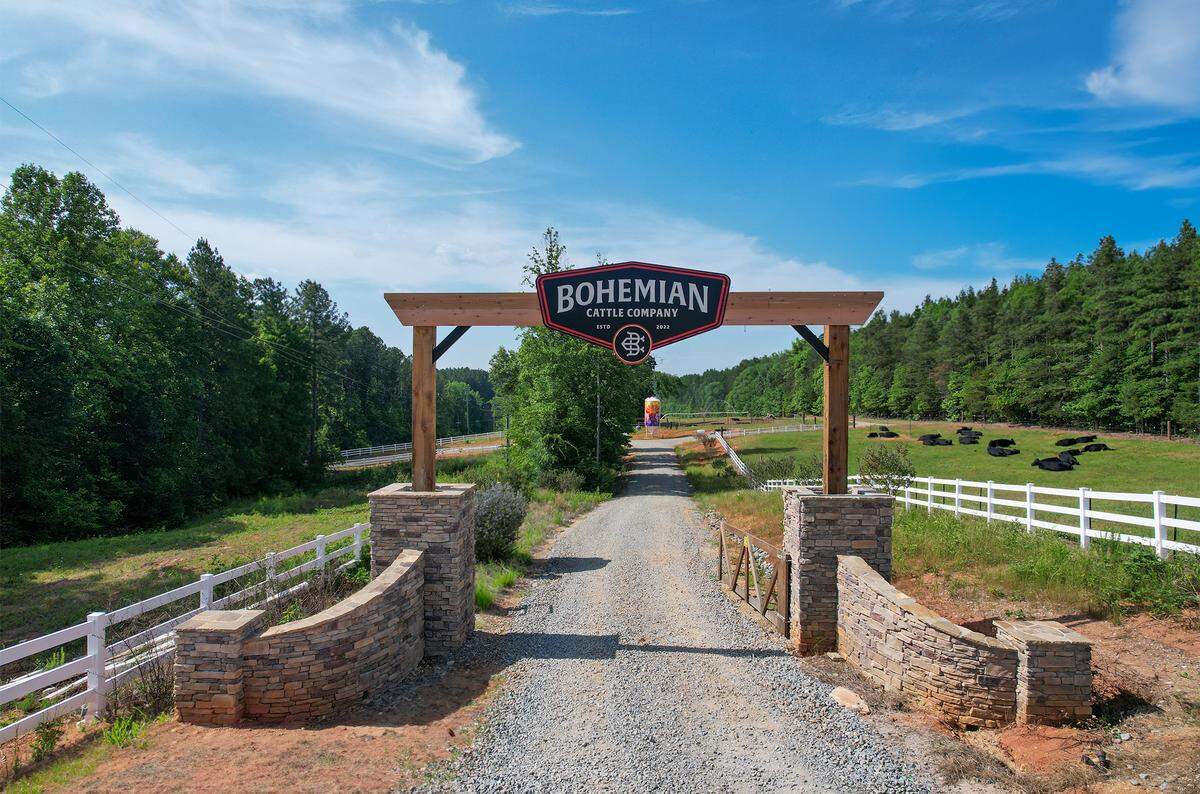 The entrance to Bohemian Cattle Co. in Sherrills Ford looks just like you’d expect when entering a ranch, with its overhead sign and rustic setting. The business closed permanently after a run-in with Catawba County health inspectors.