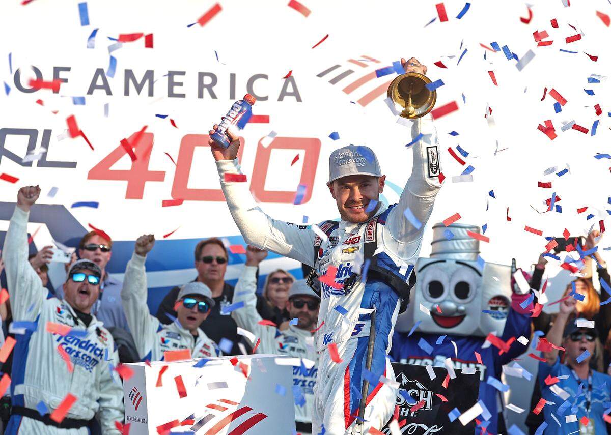 NASCAR driver Kyle Larson, the 2025 Cup Series champions, celebrates his winning the Bank of America Roval in Victory Lane with his team at Charlotte Motor Speedway in Concord, N.C. on Sunday, Oct. 13, 2024.