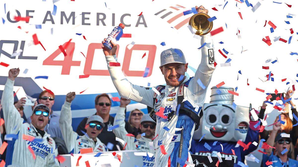 NASCAR driver Kyle Larson celebrates his winning the Bank of America Roval in victory lane with his team at Charlotte Motor Speedway in Concord, NC on Sunday, October 13, 2024.