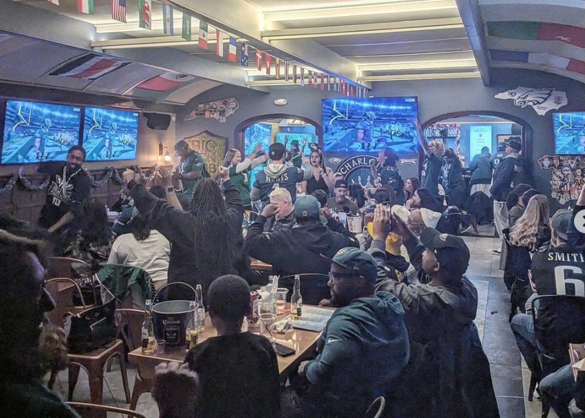 Crowds gather at Big Ben Pub with South End Social for Philadelphia Eagles games.