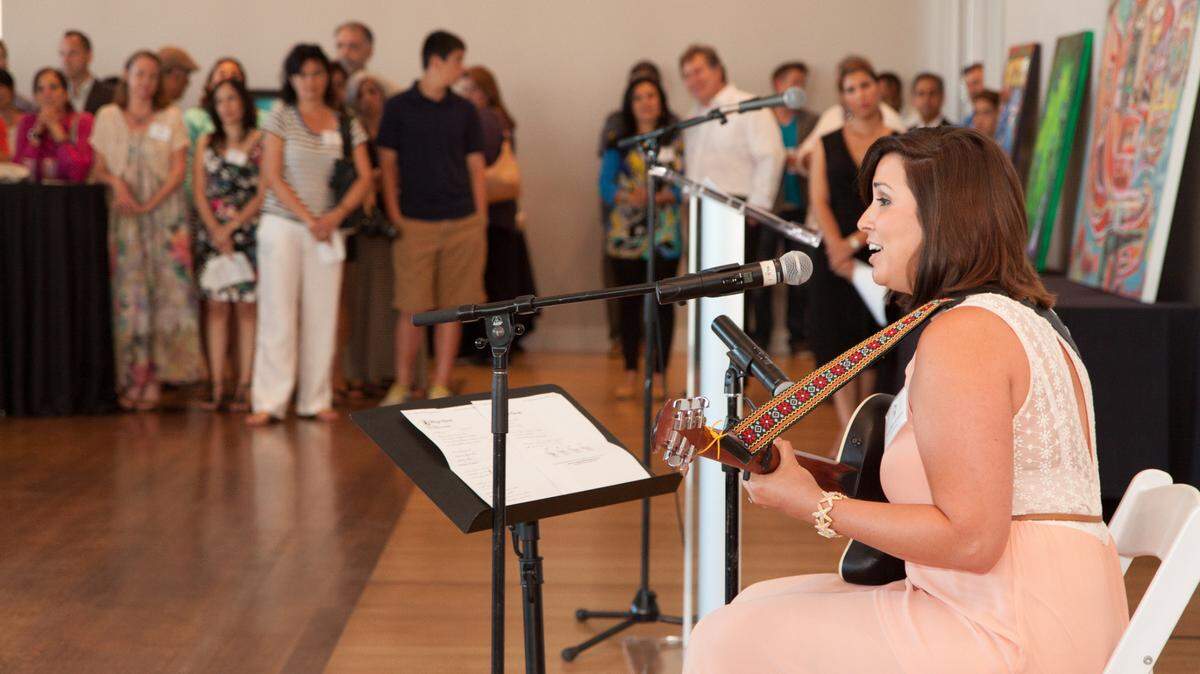 A musician performs at a Con A de Arte (“A is for Art”) event at the Mint Museum. Con A de Arte is an annual event that highlights Latin American artists. This year, an Arts & Science Council grant is helping the Latin American Coalition bring the event to a wider audience.