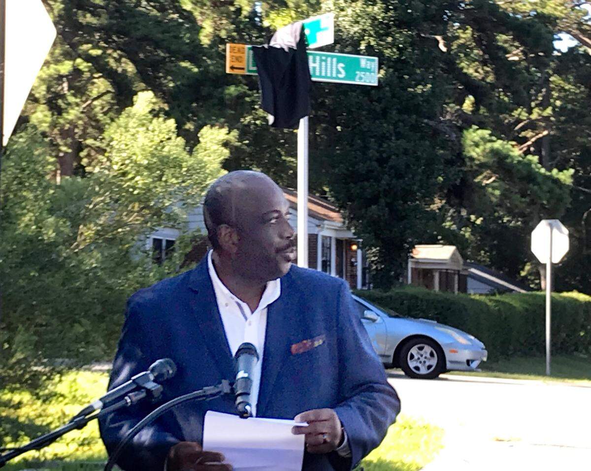 Malcolm Graham addresses the crowd during the Jefferson Davis Street renaming to Druid Hills Way on Friday, Sept. 24, 2021 in Charlotte