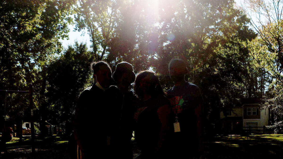 The Umbrella Center on Albemarle Road will streamline services for victims of domestic violence, sexual assault, child abuse, elder abuse and human trafficking. In this October 2022 file photo, four survivors of domestic violence stand together for a portrait.