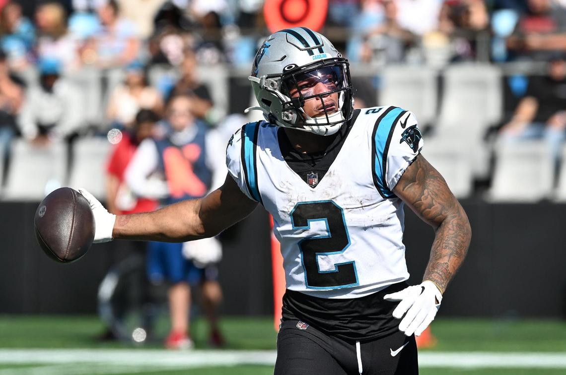 Carolina Panthers wide receiver DJ Moore tosses the football he caught for a touchdown into the stands during second quarter action against the Tampa Bay Buccaneers at Bank of America Stadium in Charlotte, NC on Sunday, October 23, 2022.