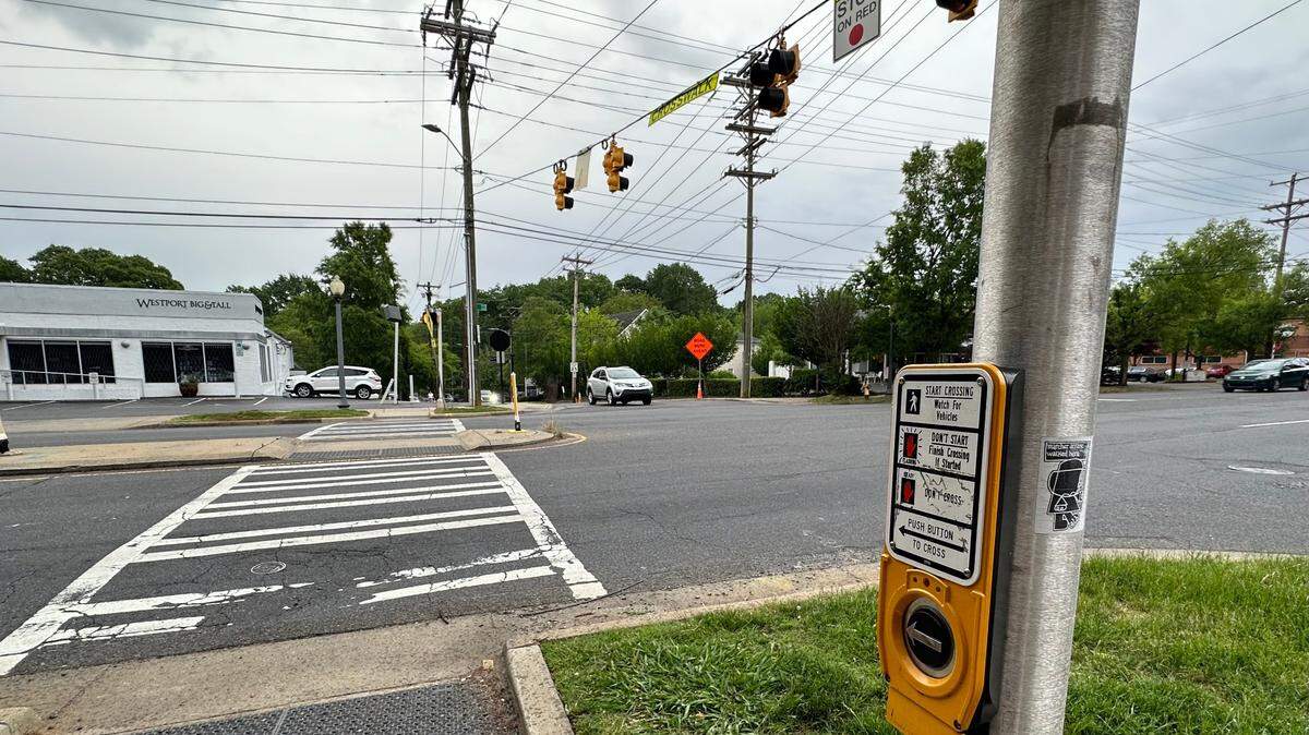 A pedestrian beacon — shown here on South Boulevard — is designed to help pedestrians safely cross busy intersections.