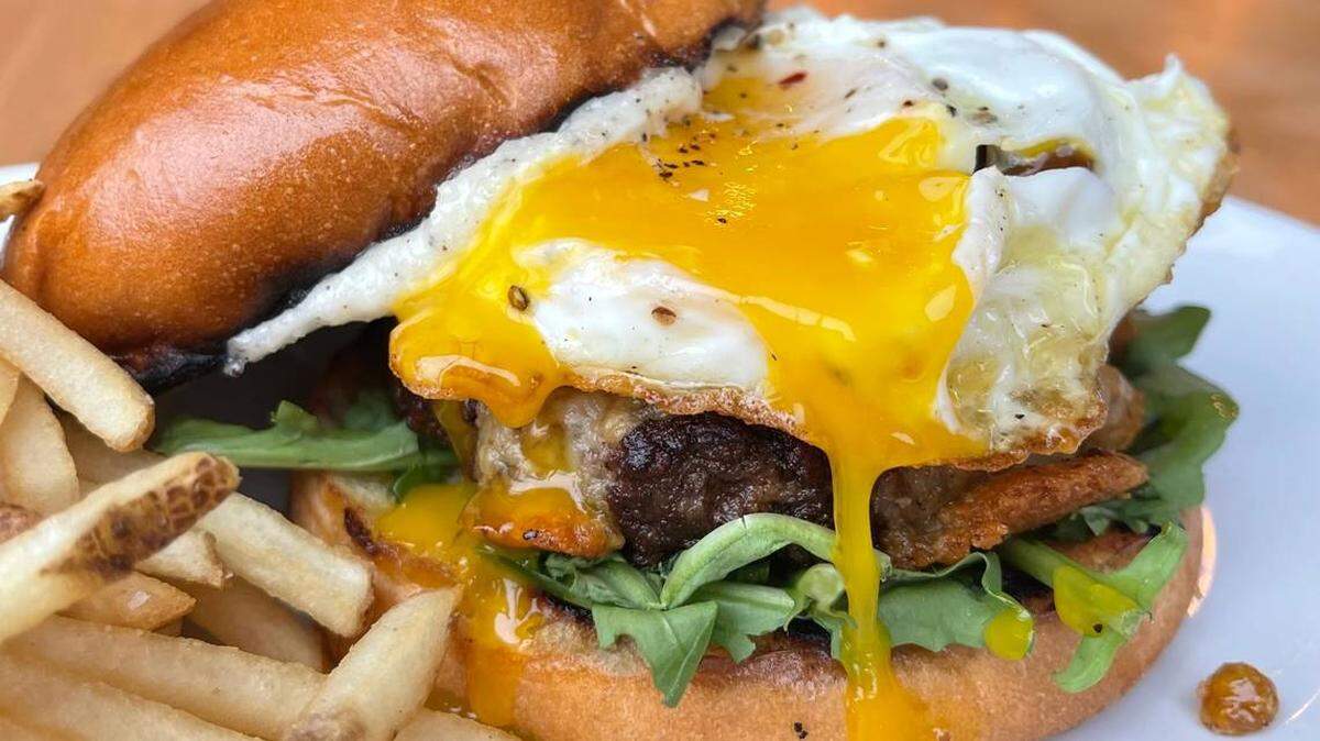 Order the carbonara burger and more Italian-style offerings during brunch at Indaco.