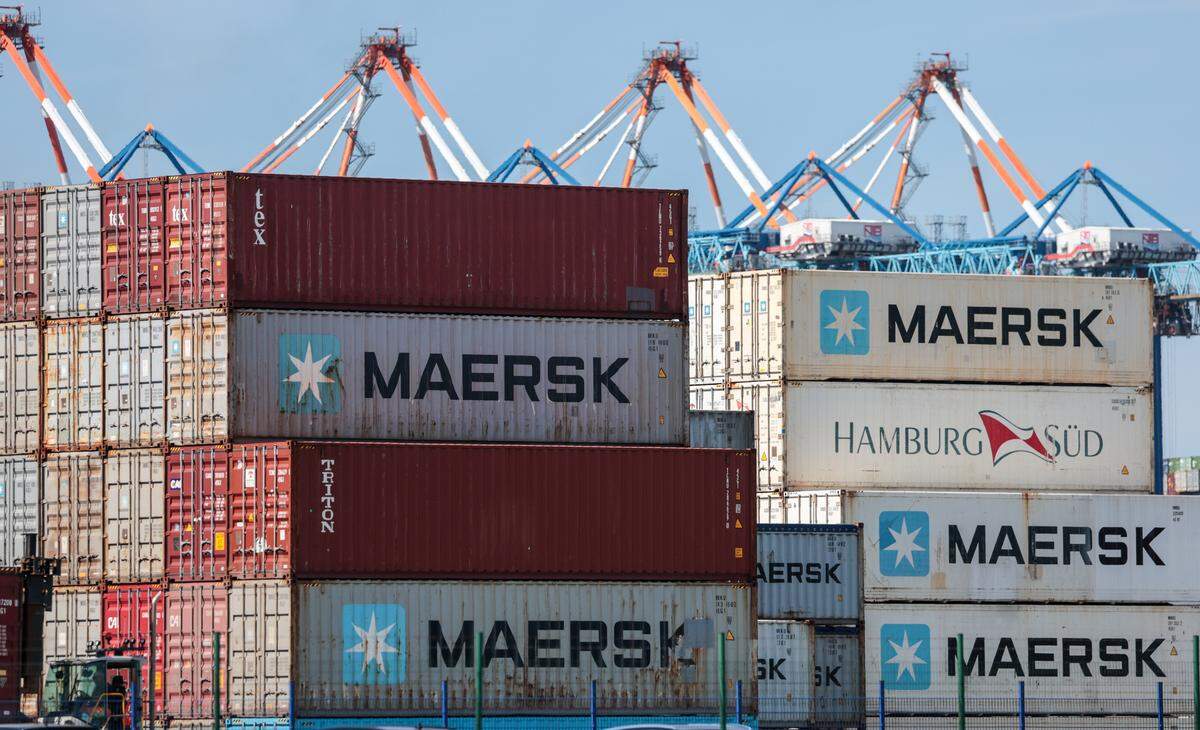 Containers of Maersk and other shipping lines are stacked at a port on Aug. 11, 2025, in Bremerhaven, Germany.