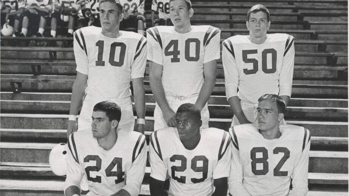 Picture day at Myers Park High in 1965 included this shot of some of the team’s best players: Quarterback Neb Hayden (10), fullback Mack Tharpe (40), center Julian Cockerham (50), halfback Johnny Wilson (24), halfback Jimmie Lee Kirkpatrick (29) and end Harris Woodside (82). 1965 Observer file photo