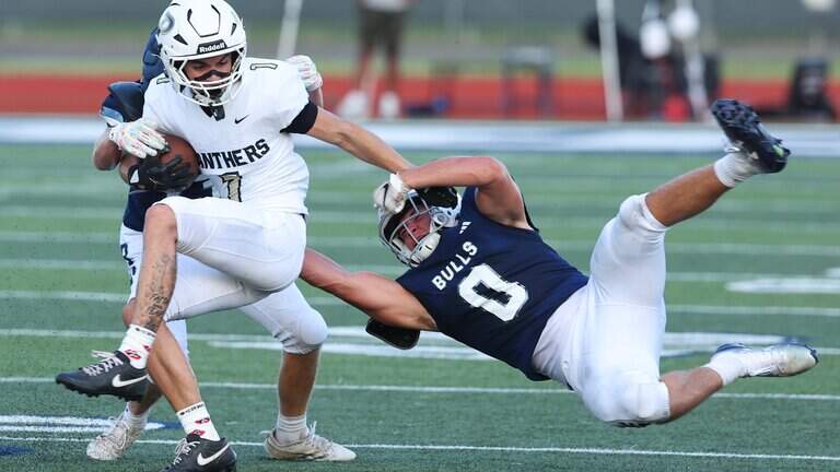 PHOTOS: Providence at Hickory Ridge high school football season-opener