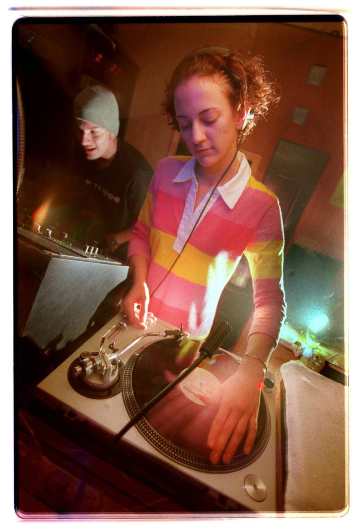 6/10/98 DJ Nicole Stallings spins her beats while DJing at Scorpio, a local club in Charlotte. Story on rising DJ culture and the new DJ “rock stars”. Nicole in one of just a handful of female DJs in Charlotte.