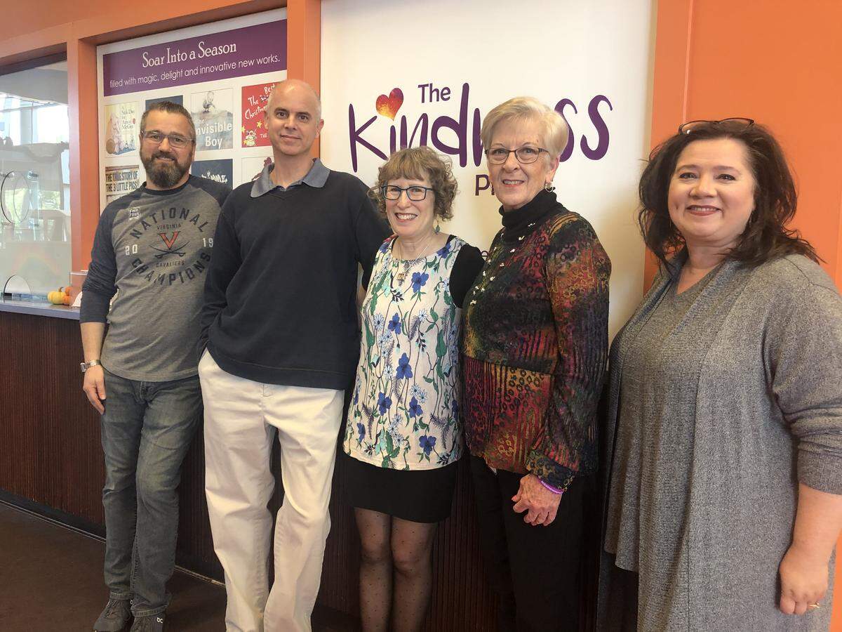 Author Trudy Ludwig (center) came to see Children’s Theatre of Charlotte’s premiere of “The Invisible Boy,” a musical based on her book of the same name. The production was part of The Kindness Project, which Linda Reynolds helped launch in 2016. Pictured (L to R) are CTC Director of Production Steven Levine, Artistic Director Adam Burke, Ludwig, Reynolds, and CTC Education Director Michelle Long.
