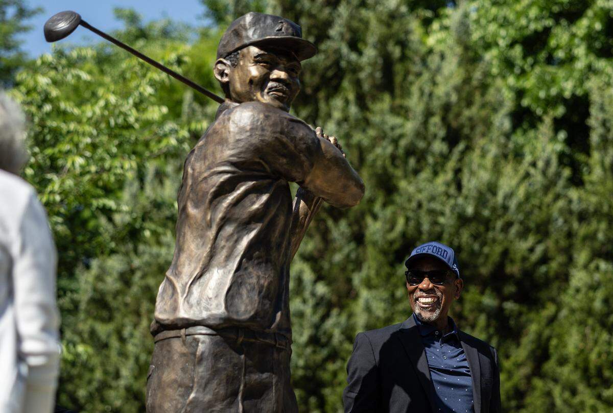 Dr. Charles Sifford’s son Charles Sifford jr. reacts to the Truist Championship’s, in partnership with the Charlotte Trail of History, unveiling of a commemorative statue honoring Dr. Charles Sifford, a Charlotte native and the PGA TOUR’s first Black member at Elizabeth Park in Charlotte, N.C., on Tuesday, May 5, 2026. 