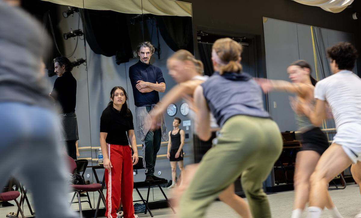 Charlotte Ballet artistic director Alejandro Cerrudo watches dancers during rehearsal for "One Thousand Pieces." The ballet makes its Charlotte debut at Knight Theater from May 7-10.