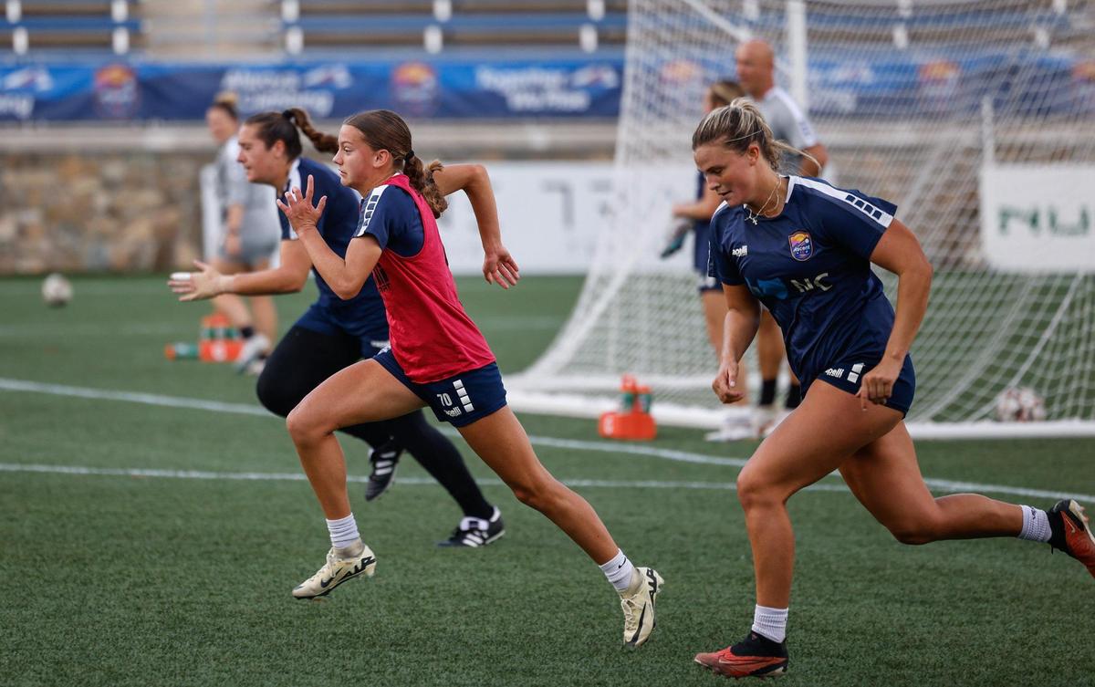 Carolina Ascent player Stella Spitzer, a 14-year-old soccer player who plays for a professional team in Charlotte, runs the field with her teammates after practice on Thursday, October 31, 2024. Spitzer is among the youngest pro soccer players in the country.