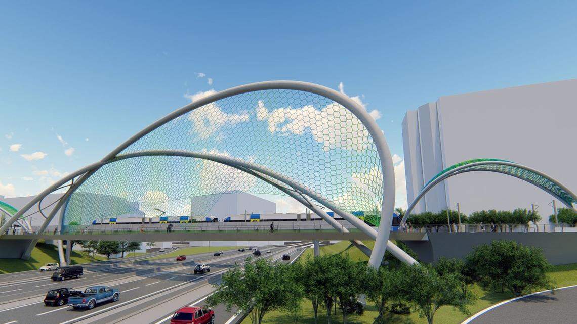 The single-span option for the Rail Trail Bridge would rise about 75 feet above the platform, transforming Charlotte’s skyline.