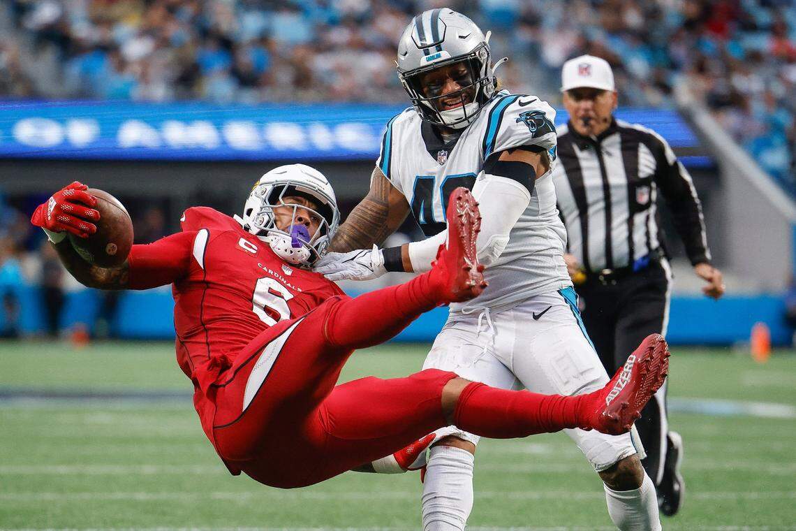 Carolina Panthers linebacker Frankie Luvu (49) is called for an unnecessary roughness penalty against Arizona Cardinals running back James Conner (6) during a game at Bank of America Stadium in Charlotte, N.C., Sunday, Oct. 2, 2022.