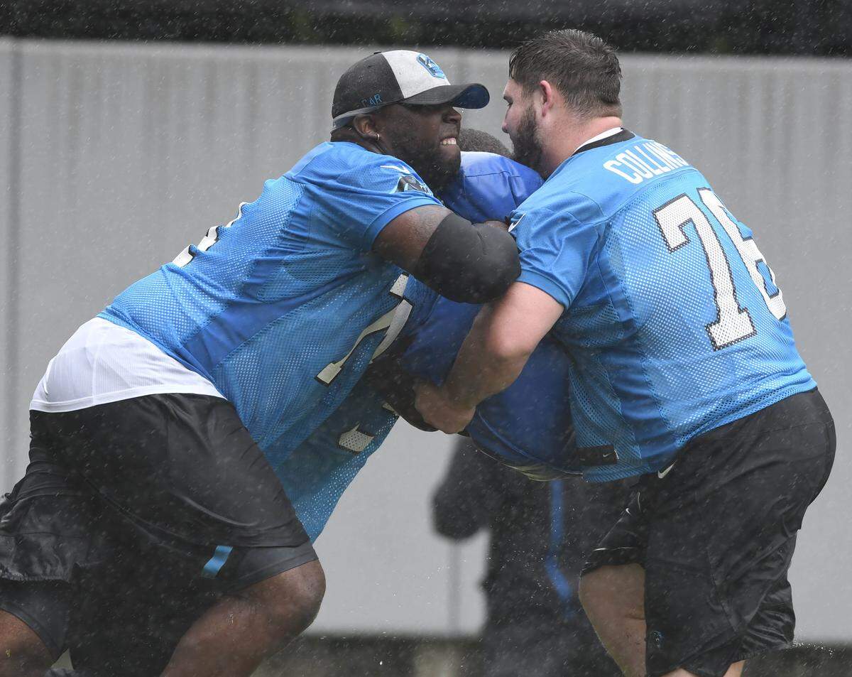 Carolina Panthers rookie Greg Little (74, left) works against Parker Collins (76) during a drill in the first session of rookie camp at the team’s practice field on Friday, May 10, 2019.
