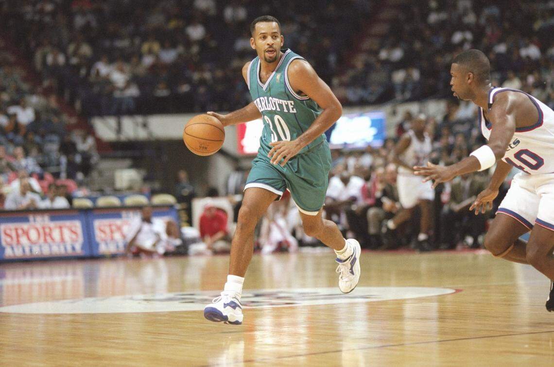 Guard Dell Curry of the Charlotte Hornets dribbles the ball down the court during a game against the Washington Bullets on Nov. 8, 1996, at S Air Arena in Landover, Maryland. The Hornets won the game 102-87. 