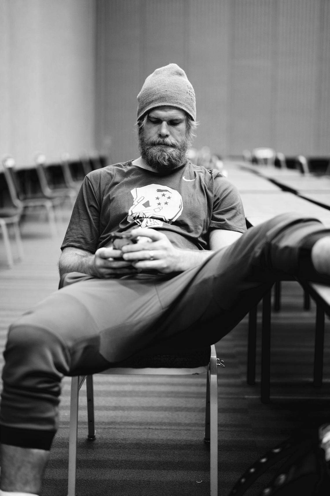Panthers tight end Greg Olsen, during a down moment prior to Super Bowl 50, checks his cell phone. “We didn’t even know Ryan was taking photos after a while that week,” Olsen says now. “We just got used to him having a camera in his hands. What he captured were some candid photos that showed that team’s true personality.”
