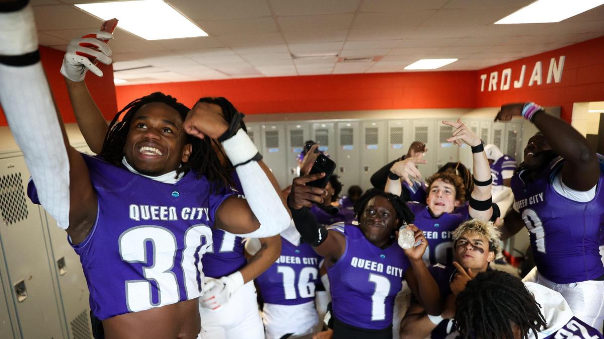 East team’s Linebacker Jayden Olden (30) of Monroe dances with the team during halftime during the Queen City Senior Bowl at Olympic High School in Charlotte, NC on December 13, 2023. The West team wins the Queen City Senior Bowl with a final of 21-14.