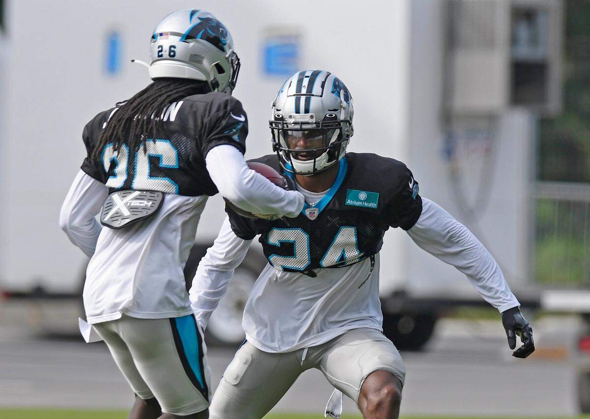 Carolina Panthers safety T.J. Green (24) defends cornerback Donte Jackson (26) during training camp in Charlotte, NC on Friday, August 28, 2020.