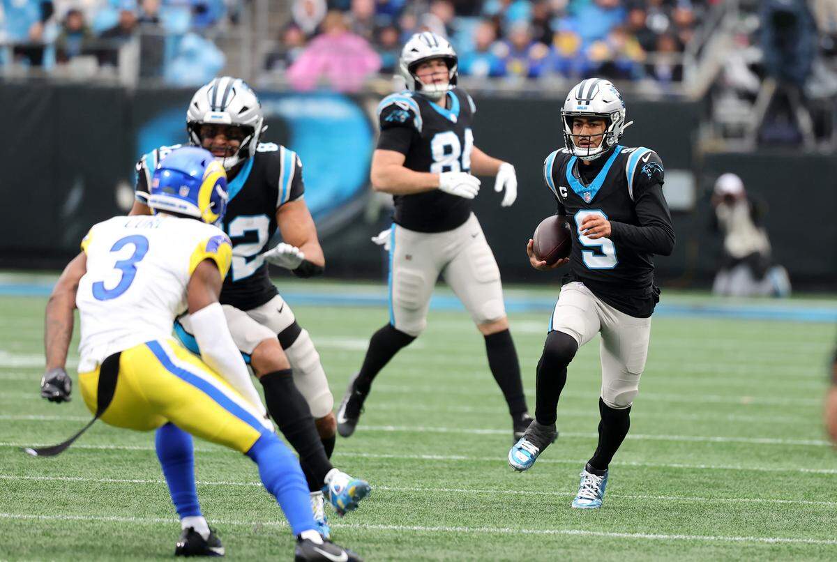 Panther QB Bryce Young carries the ball Nov. 30, 2025, in his team’s 31-28 win over the L.A. Rams. The two teams will meet again in the first round of the playoffs.
