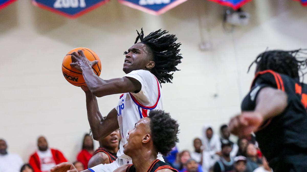 Chambers Nick Dorn puts on the defense against North Meck