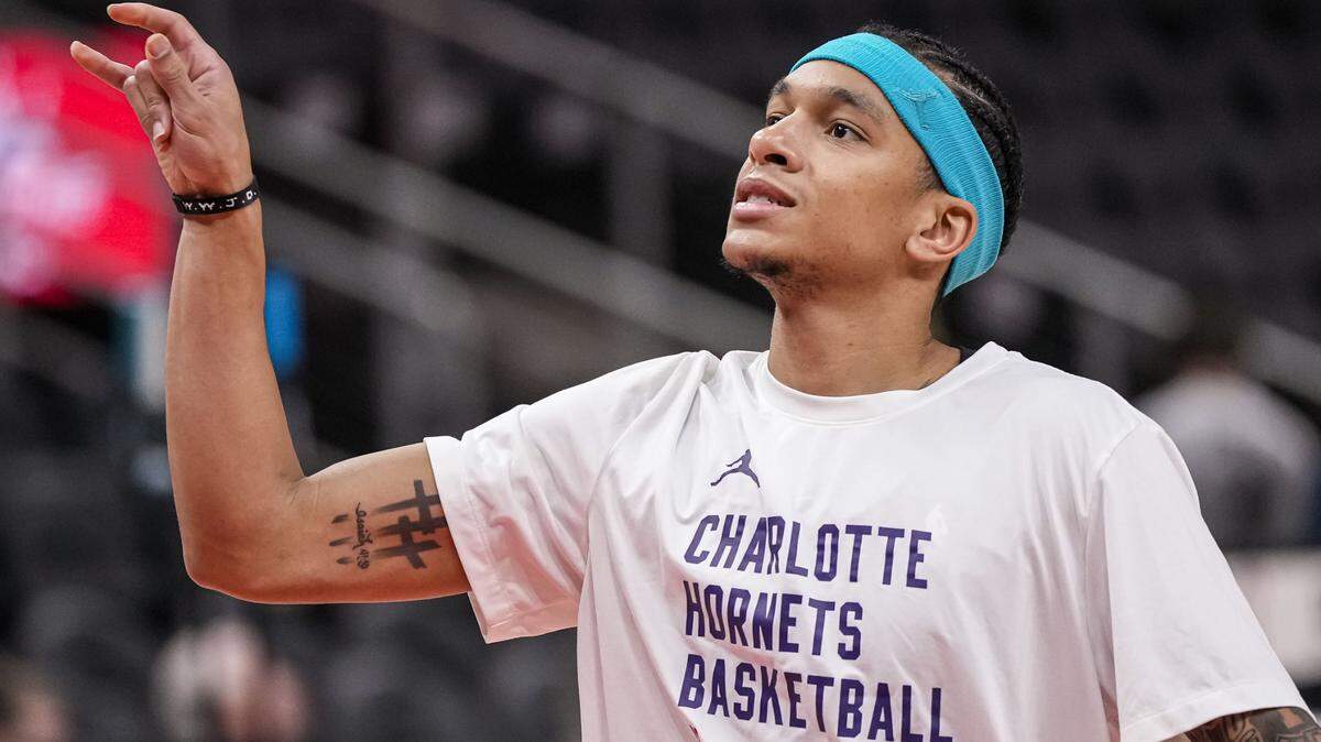 Charlotte Hornets guard Tre Mann (23) shown on the court prior to the game against the Atlanta Hawks at State Farm Arena.