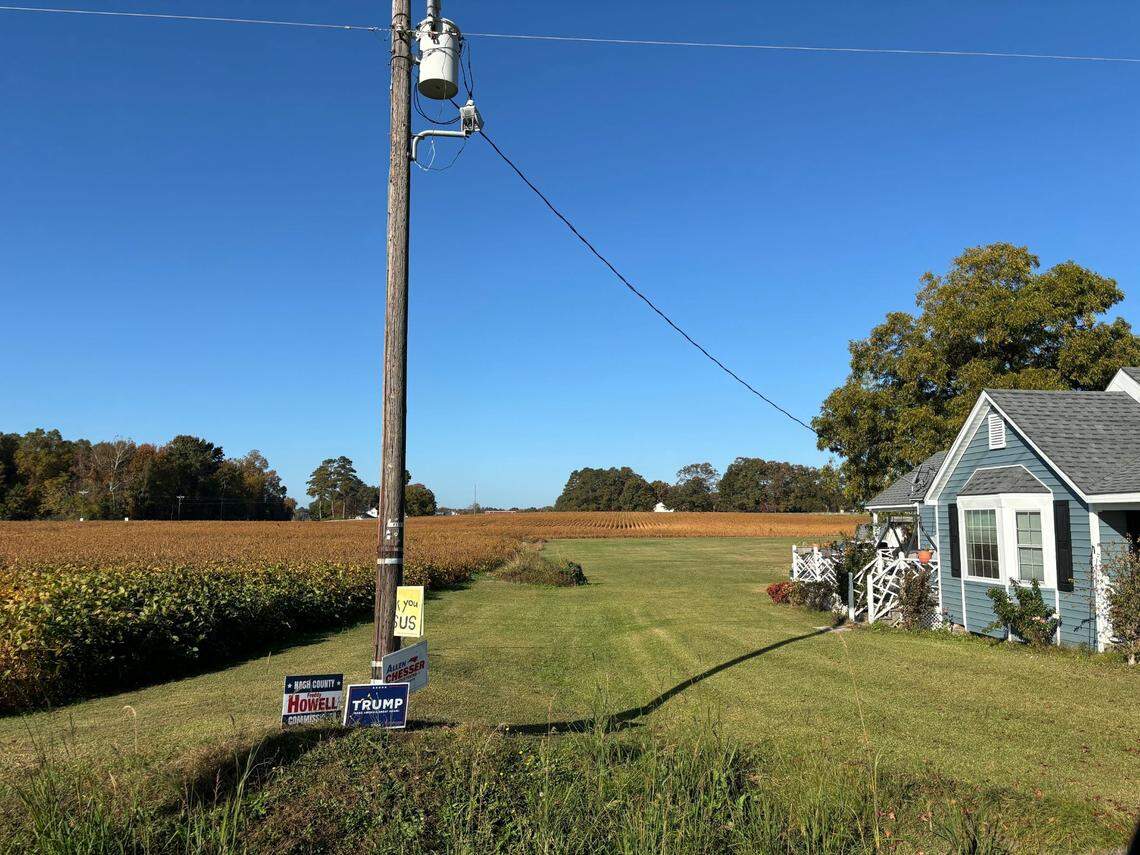 Political signs stand in front of a rural home in Nash County on Thursday, Oct. 31, 2024.