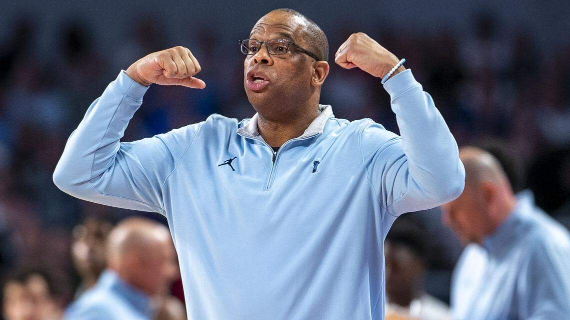 North Carolina coach Hubert Davis directs his team on defense in the second half against Baylor on Saturday, March 19, 2022 during the NCAA Tournament at Dickies Arena in Ft. Worth, TX.