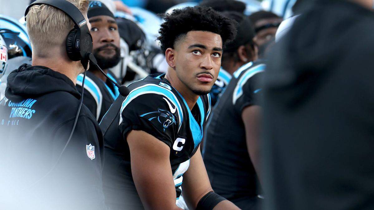 Carolina Panthers rookie quarterback Bryce Young glances up at the scoreboard during second half action against the Dallas Cowboys on Nov. 19. Young and the Panthers have started 1-10, and on Monday his head coach and QB coach were fired.