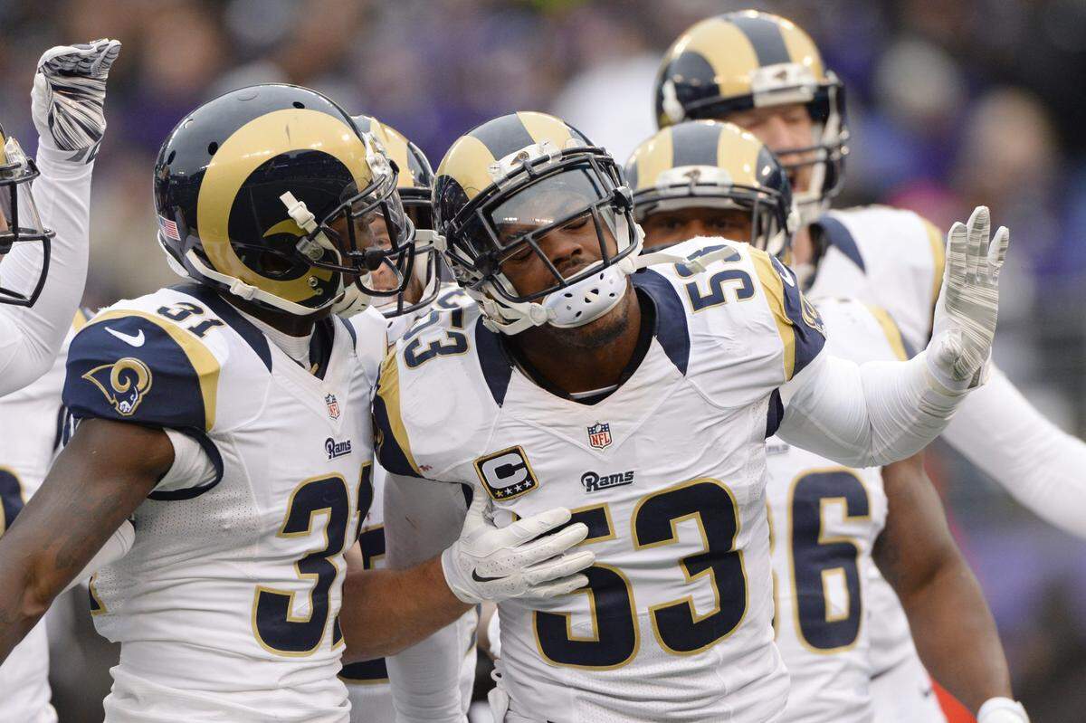 Nov 22, 2015; Baltimore, MD, USA; St. Louis Rams linebacker Daren Bates (53) celebrates with his teammates after making a tackle during the third quarter against the Baltimore Ravens at M&T Bank Stadium. Baltimore Ravens defeated St. Louis Rams 16-13. Mandatory Credit: Tommy Gilligan-USA TODAY Sports