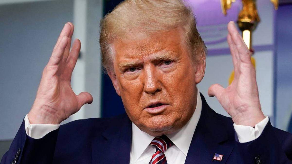Then-President Donald Trump gestures during a Sept. 27, 2020 news conference at the White House while answering questions concerning a New York Times exposé about his taxes, which said he paid $750 in federal income taxes the year he ran for president and $750 his first year in office.