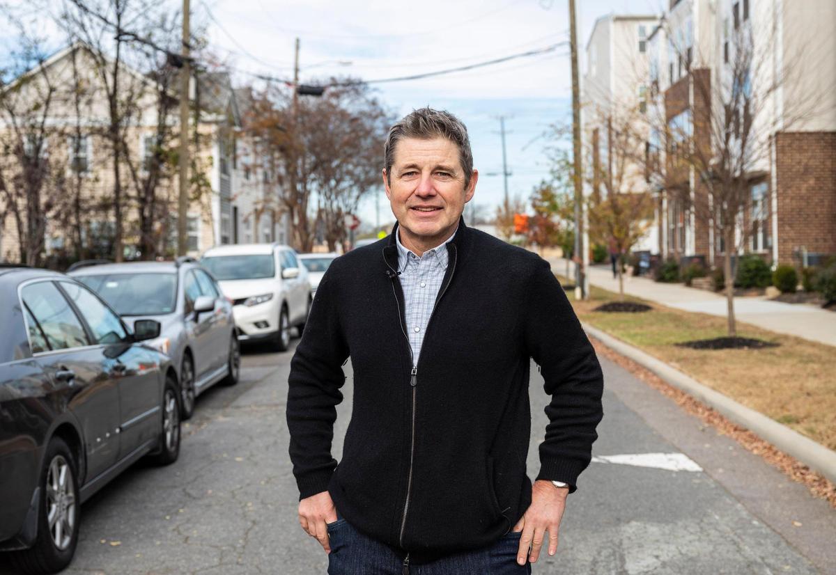 Doug Shoemaker, ecologist and director of research and outreach at UNC-Charlotte’s Center for Applied GIS, is seen near the University City Boulevard stop off the Blue Line on Thursday, December 2, 2021 in Charlotte, NC.