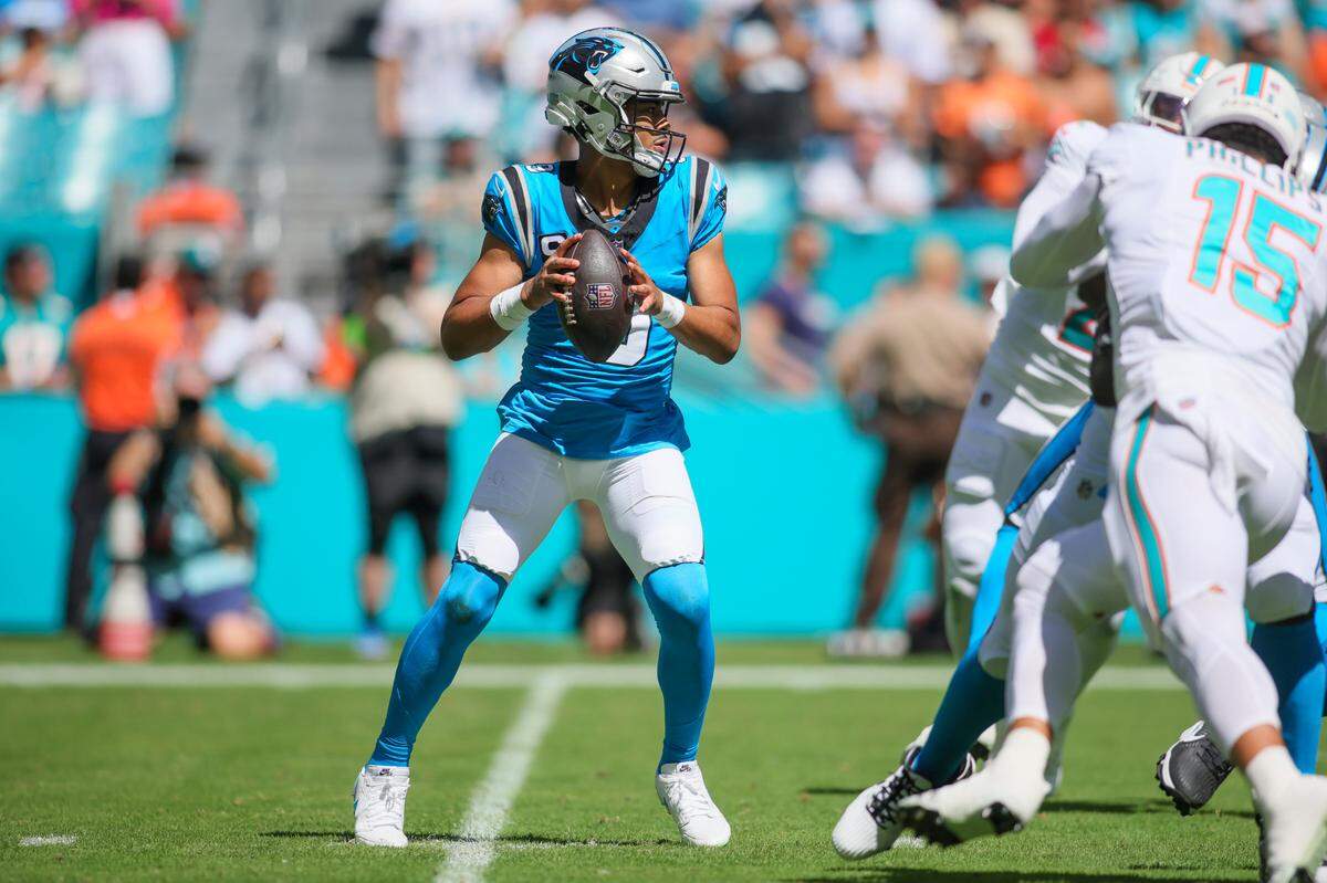 Oct 15, 2023; Miami Gardens, Florida, USA; Carolina Panthers quarterback Bryce Young (9) looks for a passing option against the Miami Dolphins during the first quarter at Hard Rock Stadium. Mandatory Credit: Sam Navarro-USA TODAY Sports