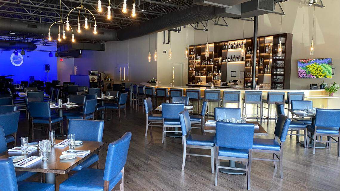 The dining room at Loretta’s carries the feel of a jazz supper club, owner John Jenkins said.