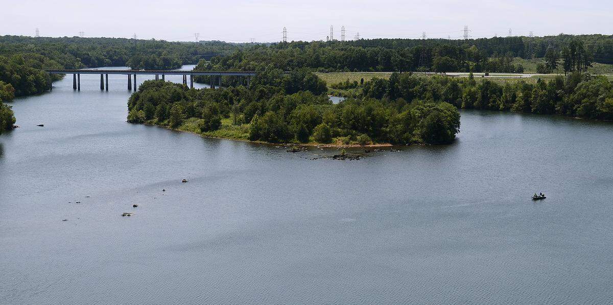 The upper reaches of Mountain Island Lake form the border between Mecklenburg and Lincoln counties as it goes beneath Hwy 73 bridge near the Cowans Ford Dam.