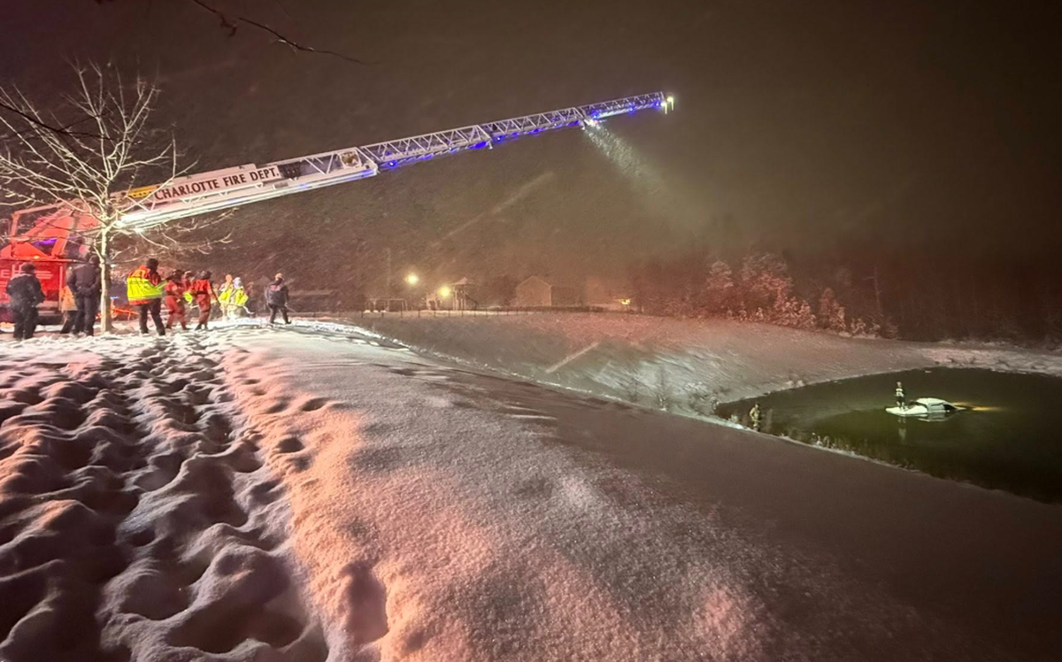 A Charlotte driver slid off the snow-covered roadway late Saturday and landed in a retention pond near Jerimoth Drive, the Charlotte Fire Department reports. The driver was found stranded in the bed of the truck.