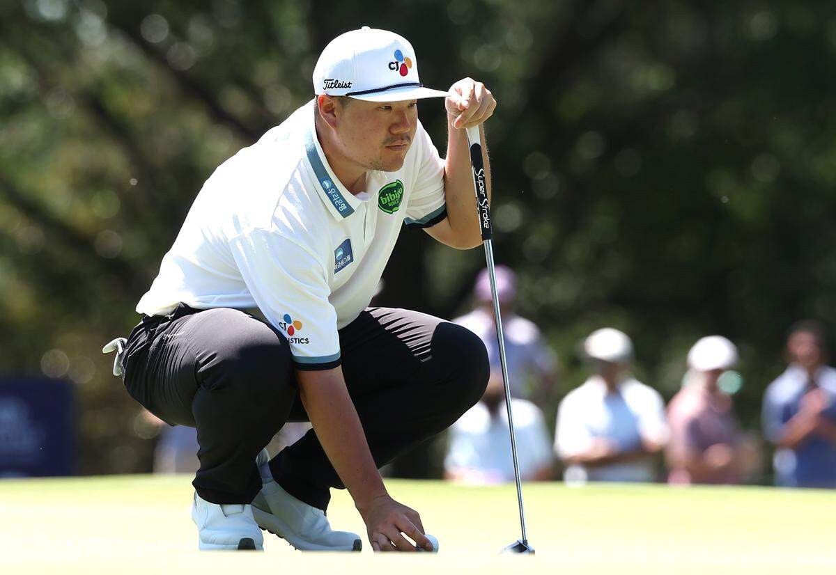 Sungjae Im lines up a putt on the fifth green during the final round of the Truist Championship at Quail Hollow Club in Charlotte, NC on Sunday, May 10, 2026.