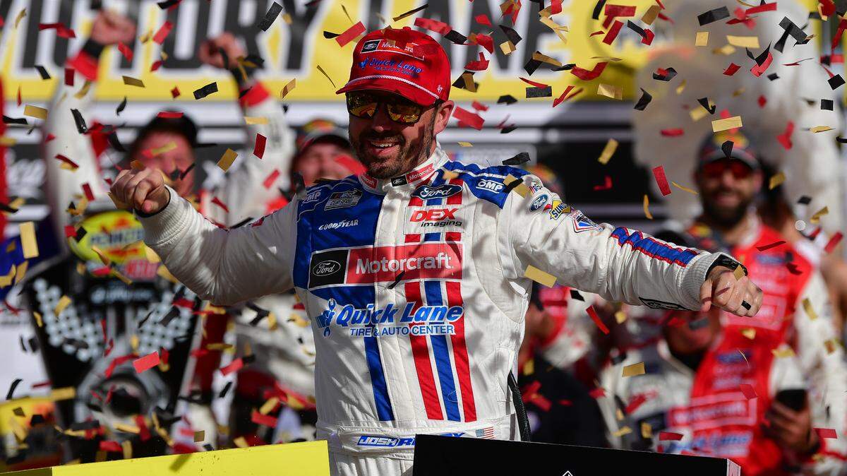 Mar 16, 2025; Las Vegas, Nevada, USA; NASCAR Cup Series driver Josh Berry (21) celebrates his victory following the Pennzoil 400 at Las Vegas Motor Speedway.