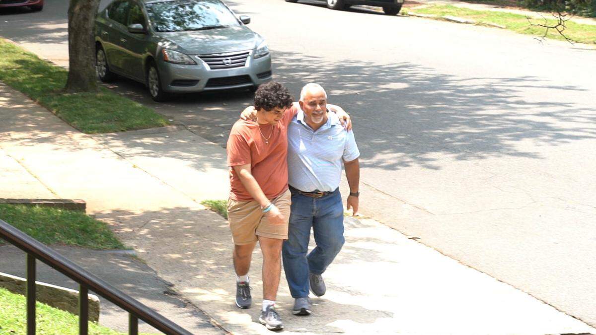 PJ and Jimmy Morales walking in Charlotte.