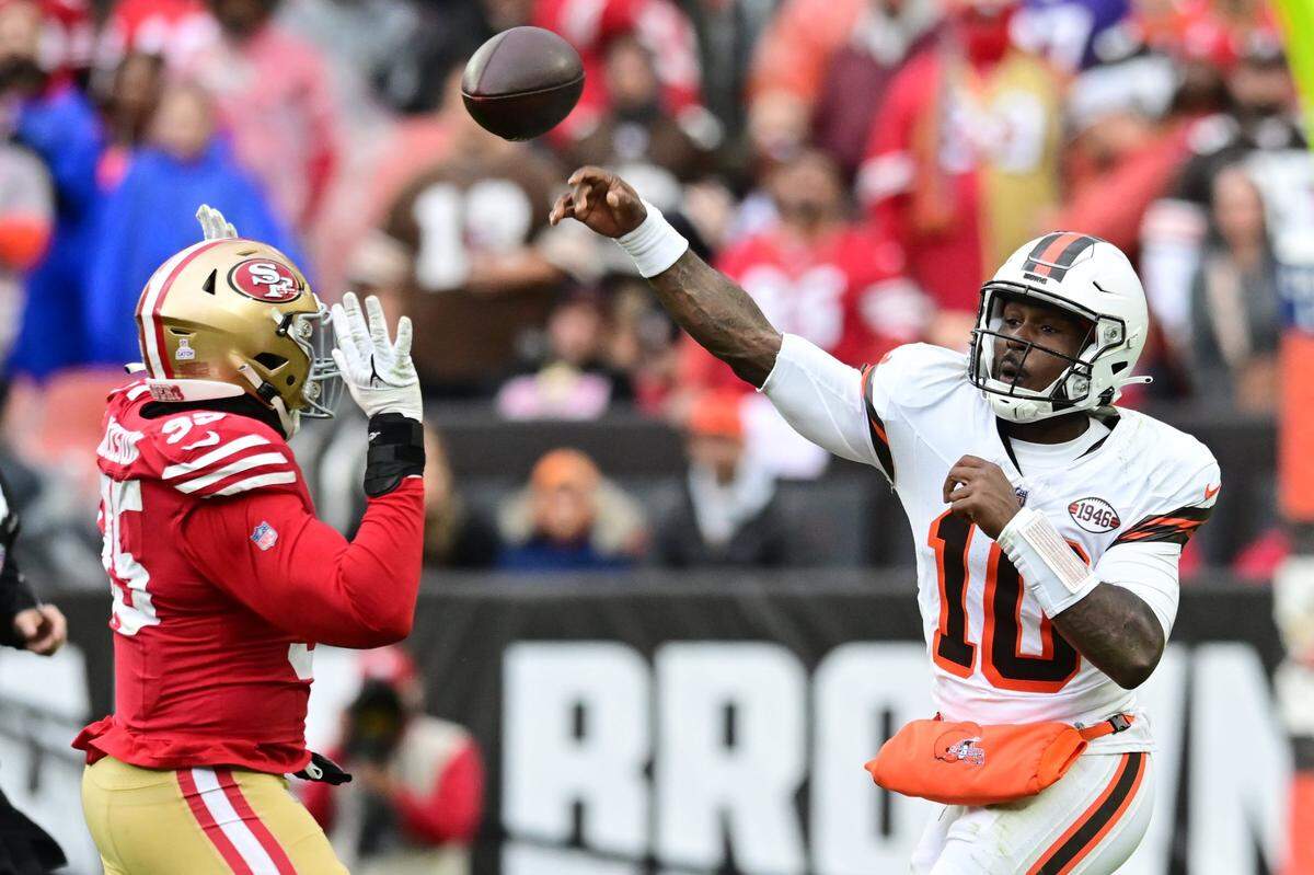 Oct 15, 2023; Cleveland, Ohio, USA; Cleveland Browns quarterback PJ Walker (10) throws a pass over San Francisco 49ers defensive end Drake Jackson (95) during the second half at Cleveland Browns Stadium. Mandatory Credit: Ken Blaze-USA TODAY Sports