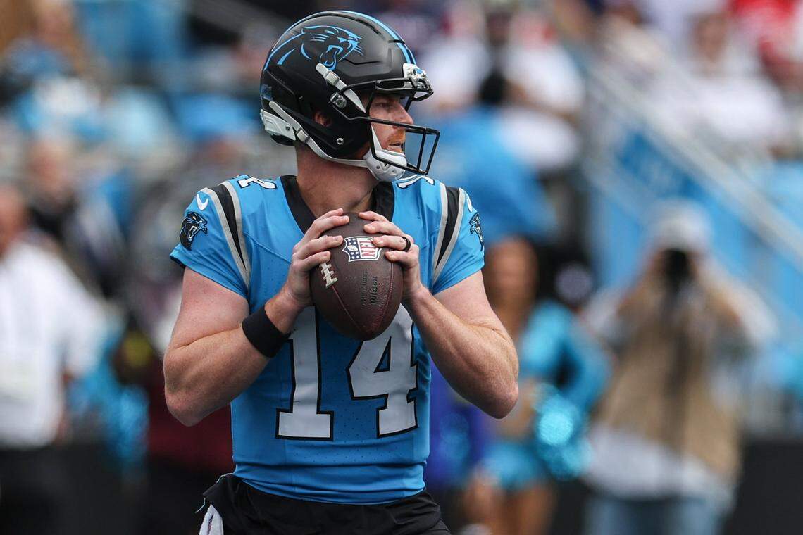 Panthers quarterback Andy Dalton scans the field for a pass during the game against the Bills at Bank of America Stadium in Charlotte, NC on Sunday, October 26, 2025.