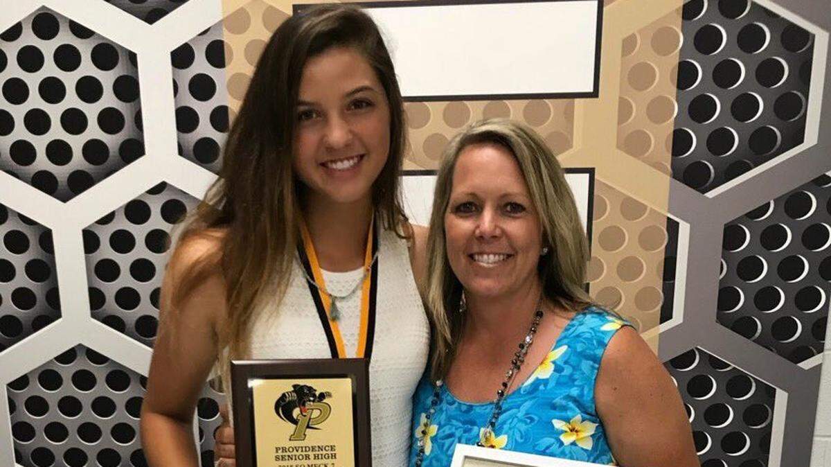Providence softball player Jenna McCauley (right) was named to the N.C. all-state team this week. Pictured with her is Providence coach Beth Baxley, the SoMeck conference coach of the year.