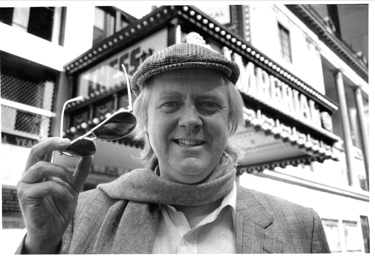 Tim Rice in 1988 on Broadway, in front of the Imperial Theater where his musical “Chess” was briefly playing. CPCC Theatre is staging the show Feb. 14-23.