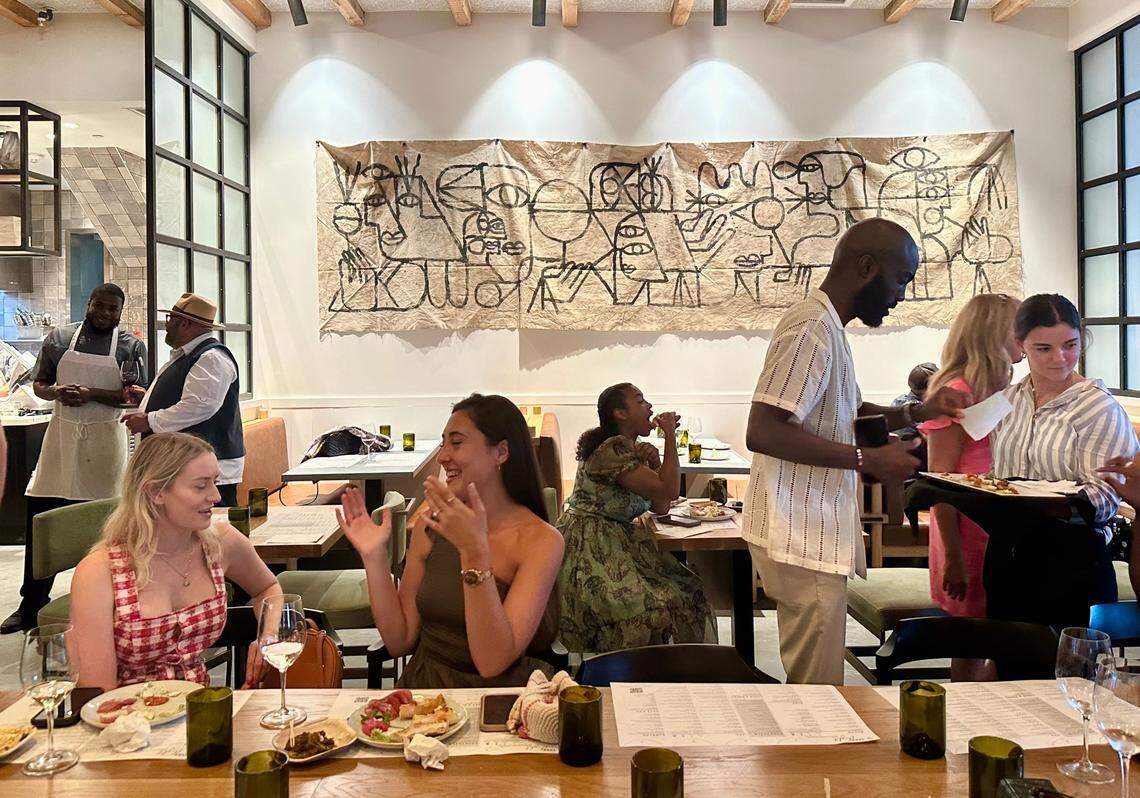 Sixty Vines’ menu includes small plates, pizza, pasta and salad.