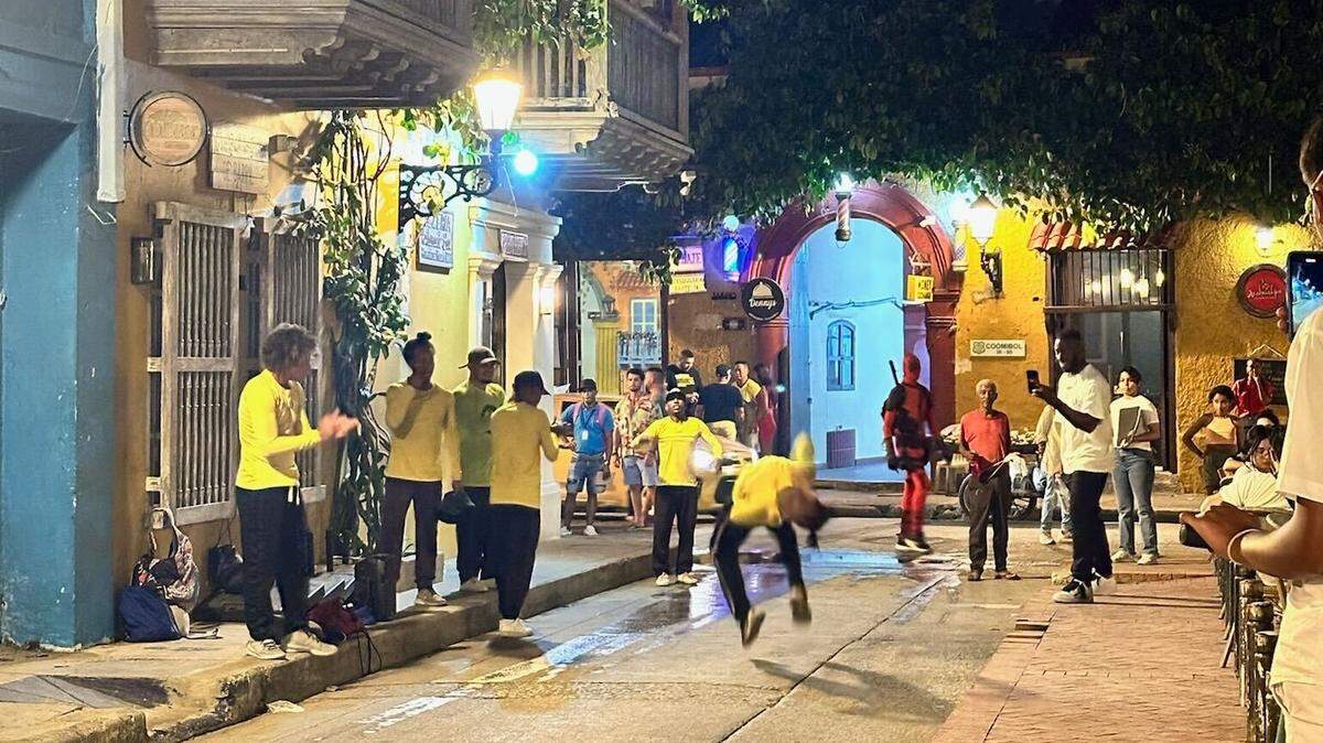 Street performers dancing during the night in Cartagena, Colombia