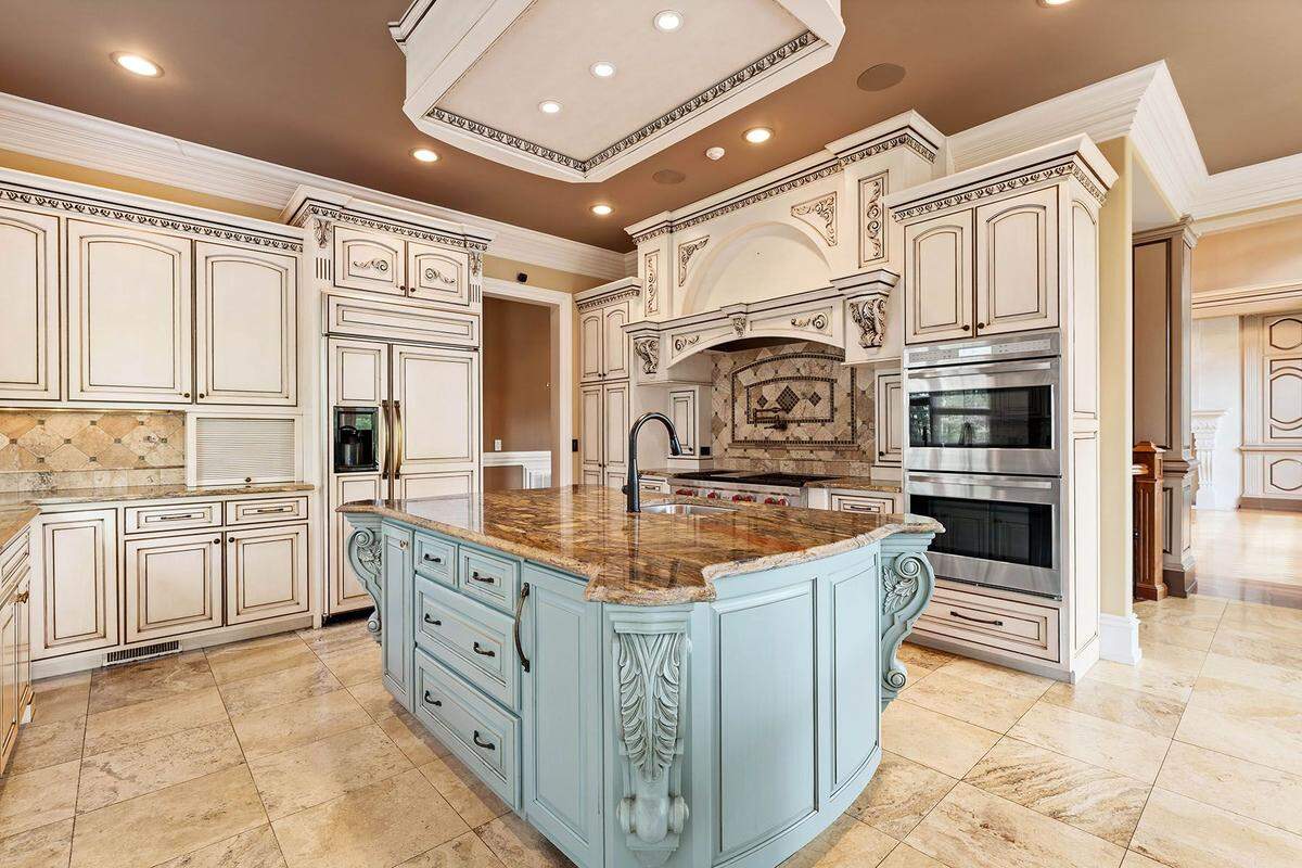 The gourmet kitchen includes “top-of-the-line” appliances, according to the announcement of the sale by the Lake Norman-Cornelius office of Premier Sotheby’s International Realty.