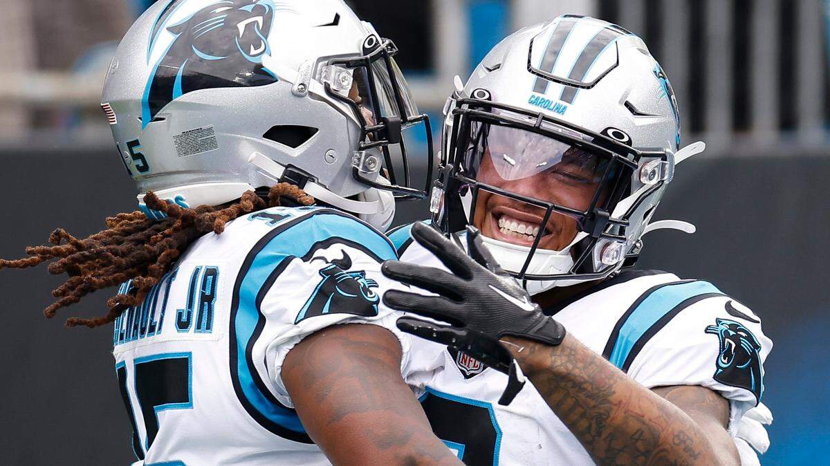 Carolina Panthers wide receiver Laviska Shenault Jr. (15) celebrates his touchdown with Carolina Panthers wide receiver DJ Moore (2) during a game against the New Orleans Saints at Bank of America Stadium in Charlotte, N.C., Sunday, Sept. 25, 2022.